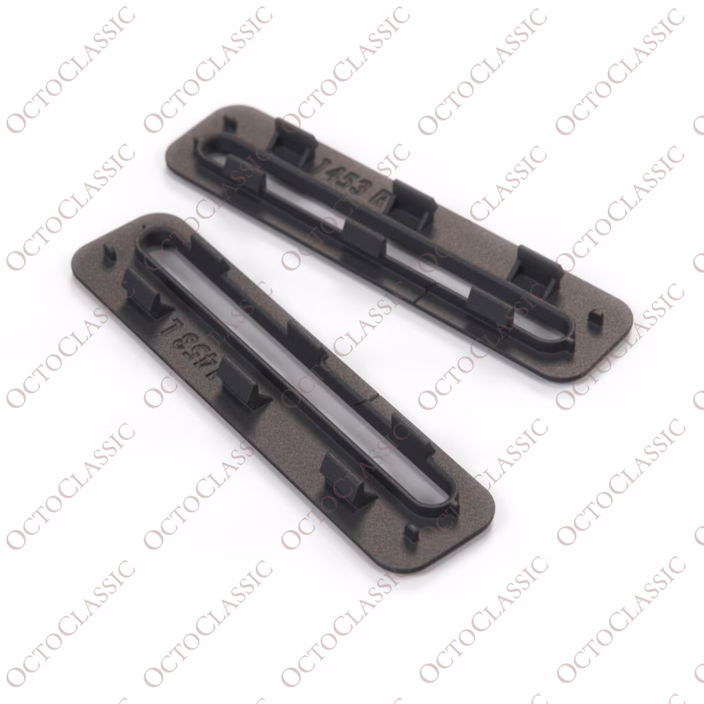 Zestaw 2 czarnych prowadnic paska Mitsubishi Eclipse 7000C795 i 7000C796