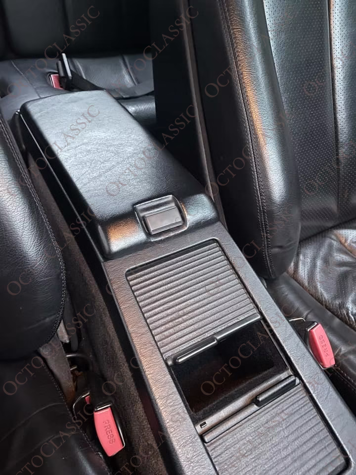R129 Pulsante di chiusura del coperchio del bracciolo A1296830155